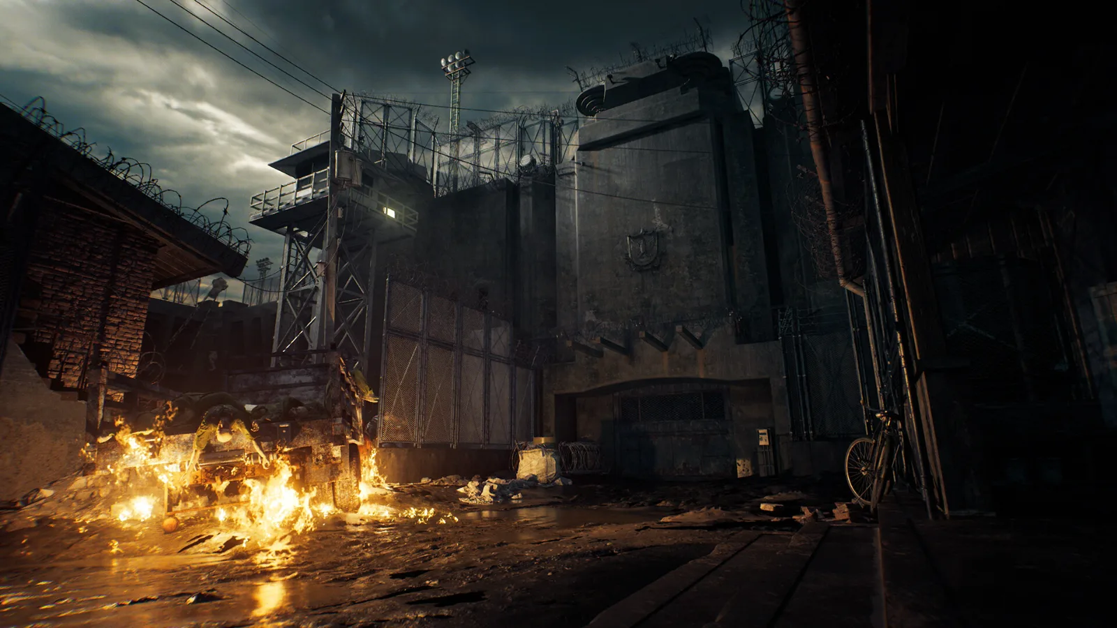 Portão da prisão da Ilha Rockfort em chamas em Resident Evil Veronica